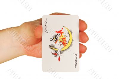  womanish hand holds a playing cards