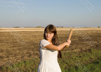 girl and baseball bat