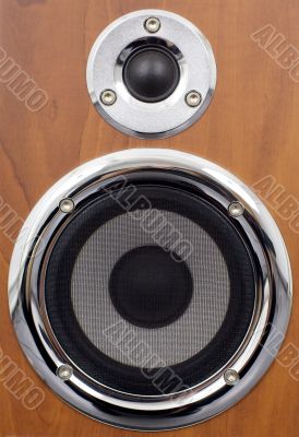 Speakers on a wooden surface