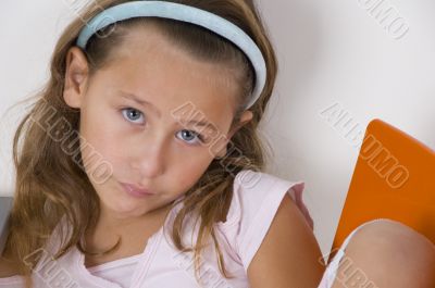 sweet little girl looking at the camera