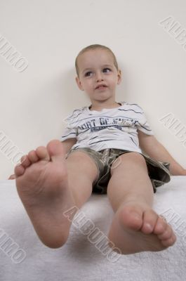 cute boy showing his legs