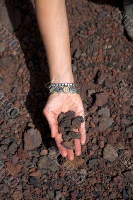 hand with stones