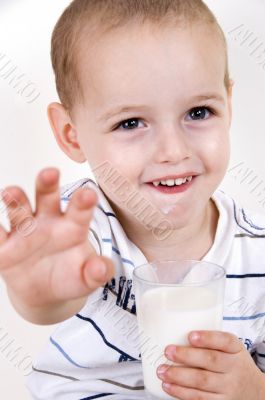 smiling boy with milk glass