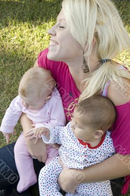 beautiful mother posing with her two kids