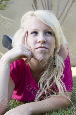 young female thinking hard