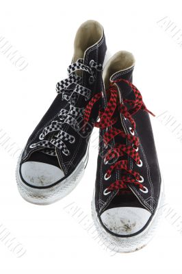 freaky shoes with a red and white shoelace