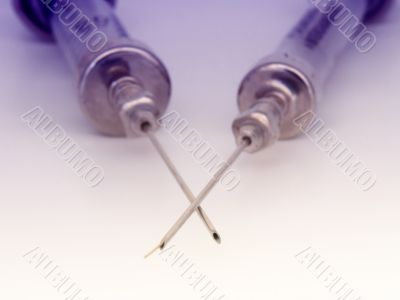 two old medical syringes
