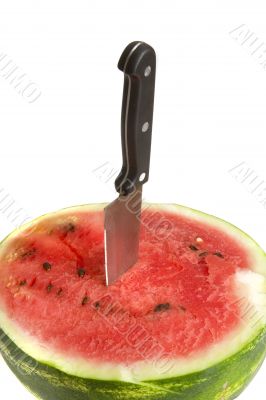 Half of juicy watermelon with knife