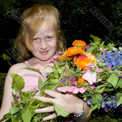 Girl with bunch of flowers