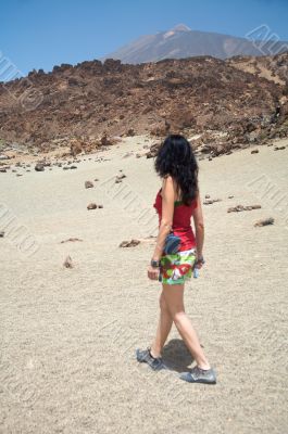 woman watching a volcano