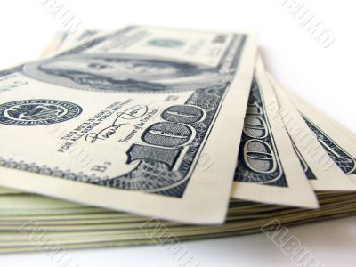stack of dollars bills isolated