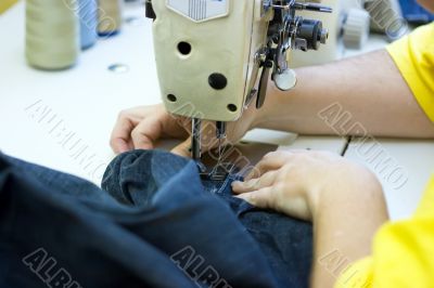 Working on a sewing machine