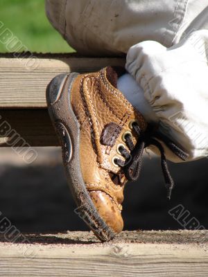 Child`s brown boot
