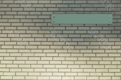 Empty sign on a brick wall
