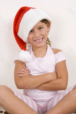 smiling girl with her arms crossed