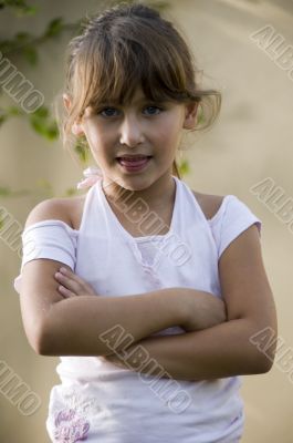 little girl with crossed arms