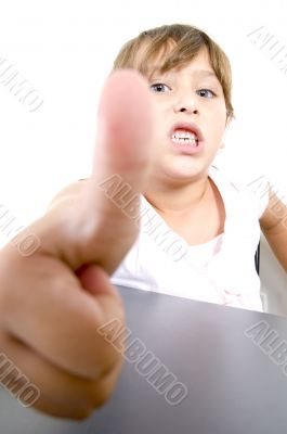 little girl showing you thumb`s up  gesture