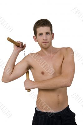 man holding nunchaku