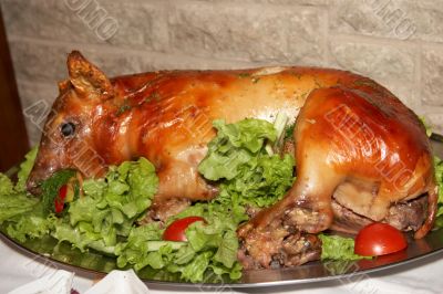 Roasted whole pig