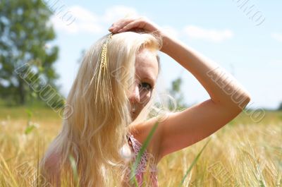 Girl with rye ears