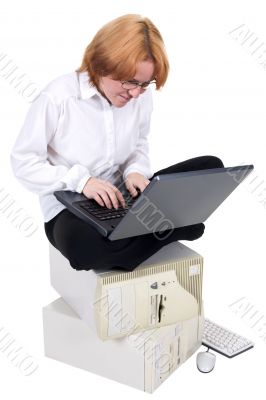 Girl working on the laptop on a white
