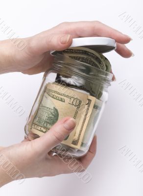  glass jar with money