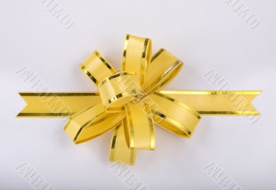 yellow christmas gift ribbon and bow