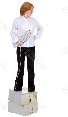 Girl standing on two computers