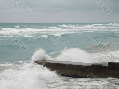 stormy tropical ocean crashing on the coast