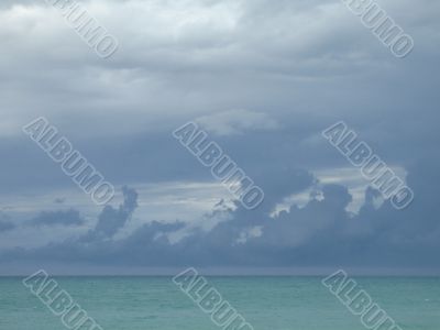 turquoise ocean and dark blue sky