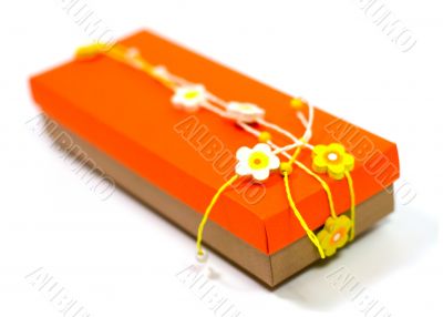 orange gift box with decoration