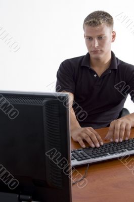 male working on notebook