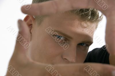 man showing framing hand gesture