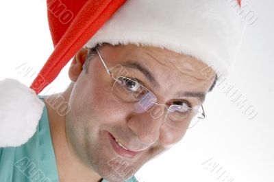 doctor wearing christmas hat