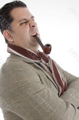 man posing with cigar in his mouth