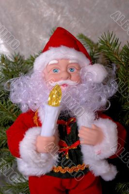 Christmas Santa Claus puppet with a candle