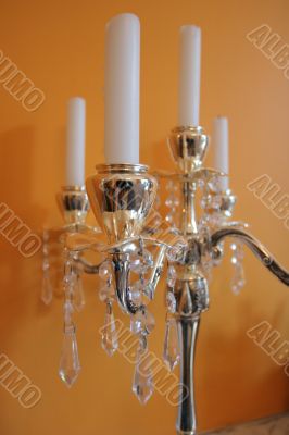 candles on a golden candleholder