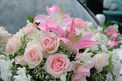 bouquet from pink roses and lilies