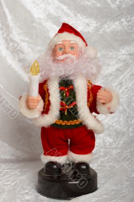 Christmas Santa Claus puppet with a candle