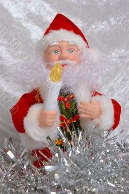 Christmas Santa Claus puppet with a candle