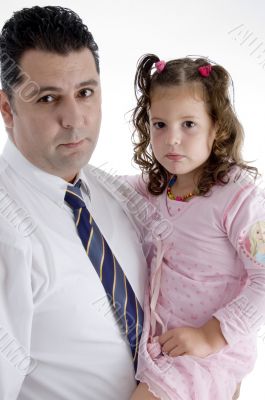 father with his daughter and looking to camera