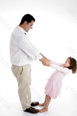 father playing with girl