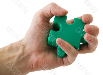 Puzzle slice in a hand