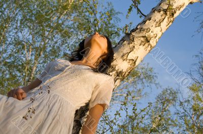 beauty girl near the birch tree