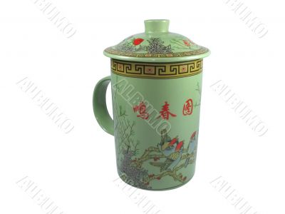 Chinese ornaments and hieroglyphs tea cup over white background