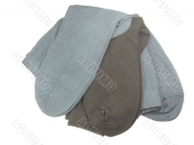 Brown and grey socks isolated over white background
