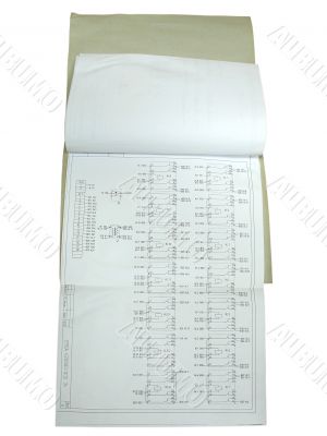 Album with electronic schemes isolated over white background