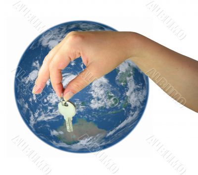 Woman hand giving the key of the world isolated over white