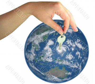 Woman hand giving the key of the world isolated over white