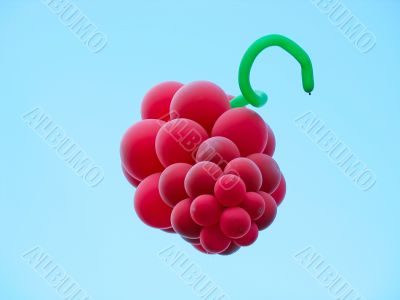 Sheaf of balloons in the form of grapes cluster against the blue sky